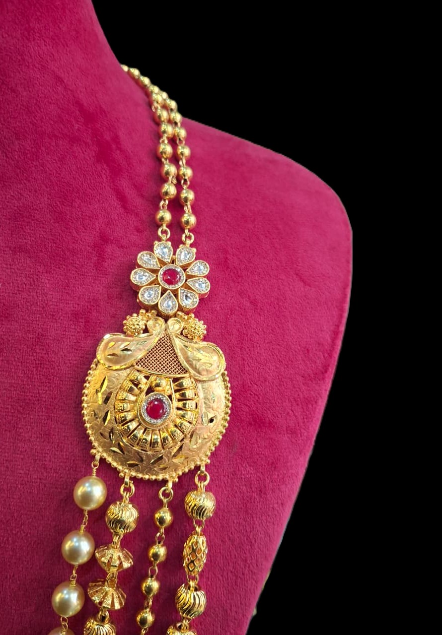 The Rani Haar with Ruby Accents