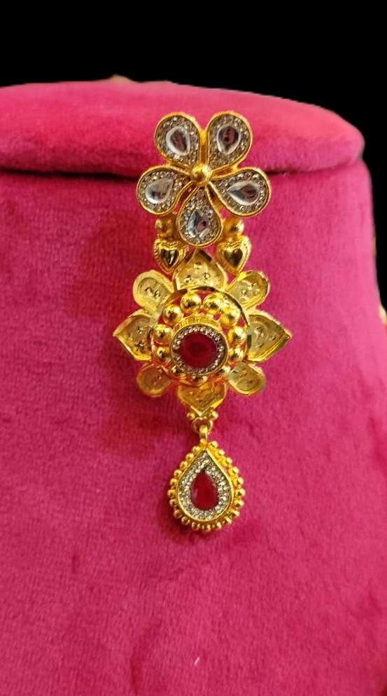 The Rani Haar with Ruby Accents